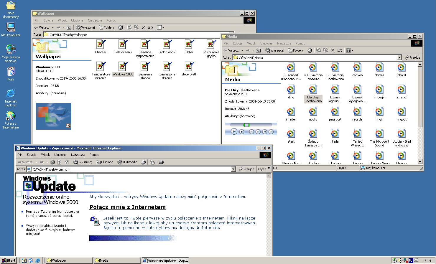 Integracja programu Windows Media Player z eksploratorem plików, otwarte okno usługi Windows Update.