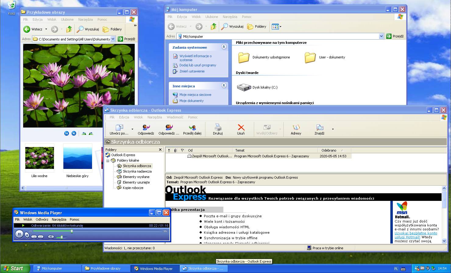 Podgląd na typową pracę z systemem Windows XP, otwarte programy- Windows Media Player, Outlook.